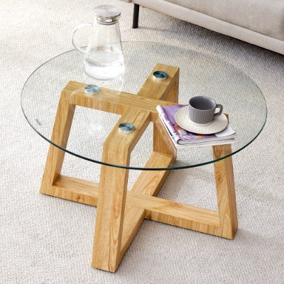 Modern Practical Circular Coffee Tables Made Of Transparent Tempered Glass Tabletop And Wood Colored MDF Material. Suitable For Living Rooms And Bedrooms